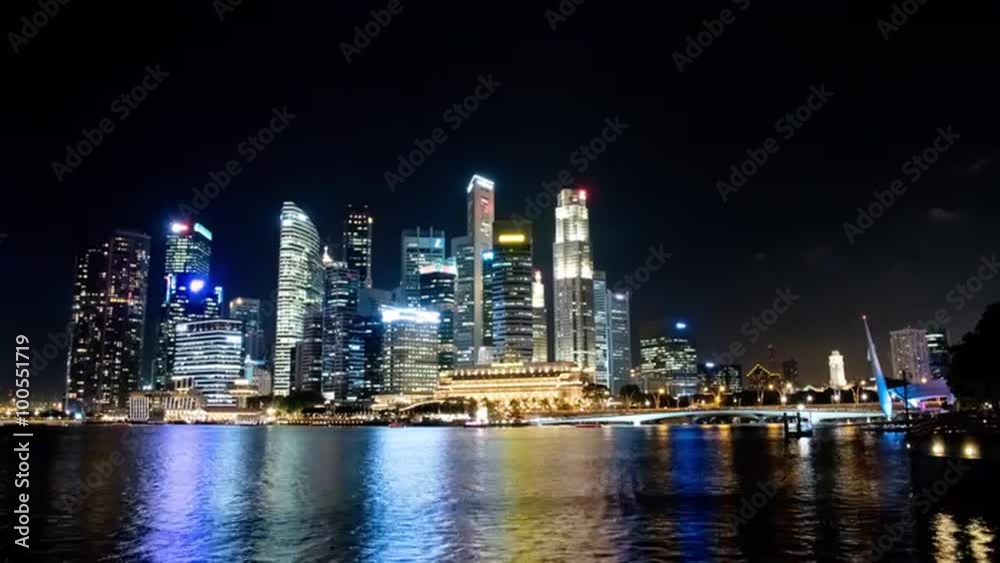 A time-lapse of the big skyscrapers in the Singapore city skyline at night. You see boats passing by in Marina Bay and the beautiful reflections in the water.
Shot in April 2015. A time-lapse of the big skyscrapers in the Singapore city skyline at night. You see boats passing by in Marina Bay and the beautiful reflections in the water.
Shot in April 2015.
