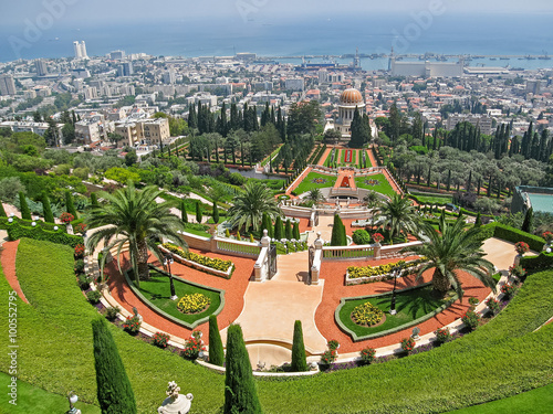 View on Bahai garden terraces with Shrine of Bab against harbor background. Haifa, Israel. photo