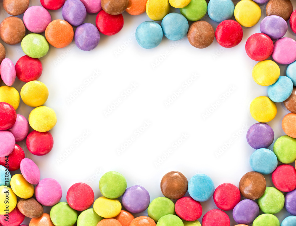 Frame of colorful rounded candies, smarties isolated on white background Frame of colorful rounded candies, smarties isolated on white background