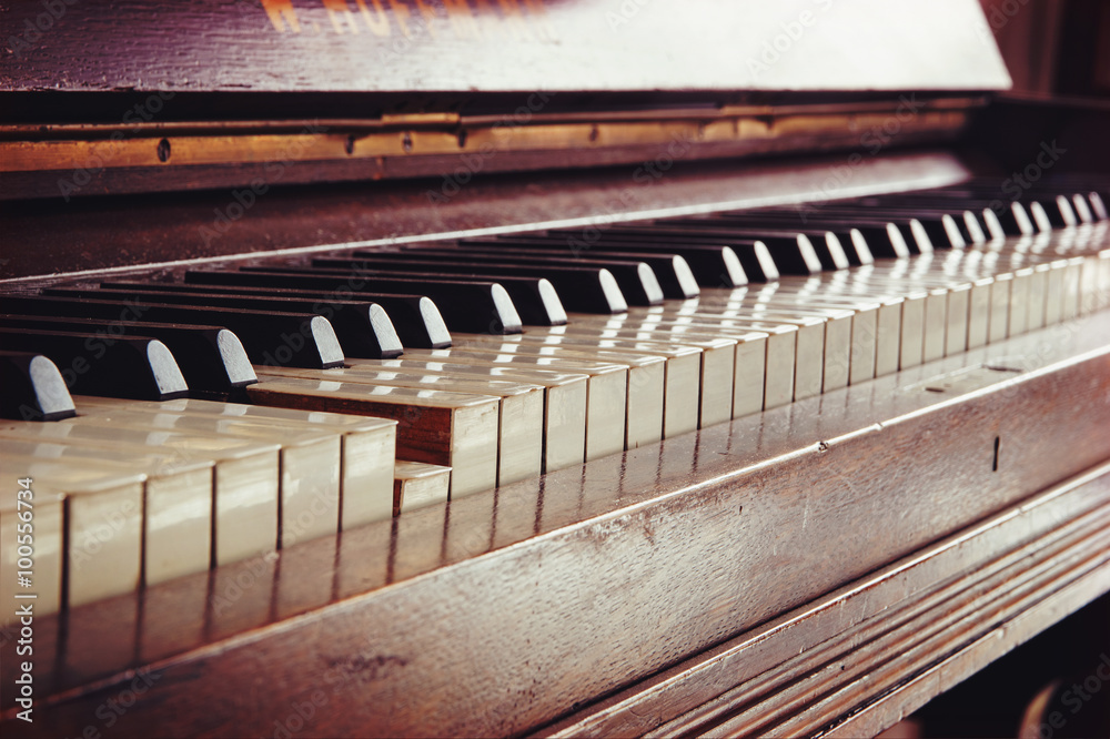 old piano keyboard, one key is pressed, music concept in warm co Stock  Photo | Adobe Stock
