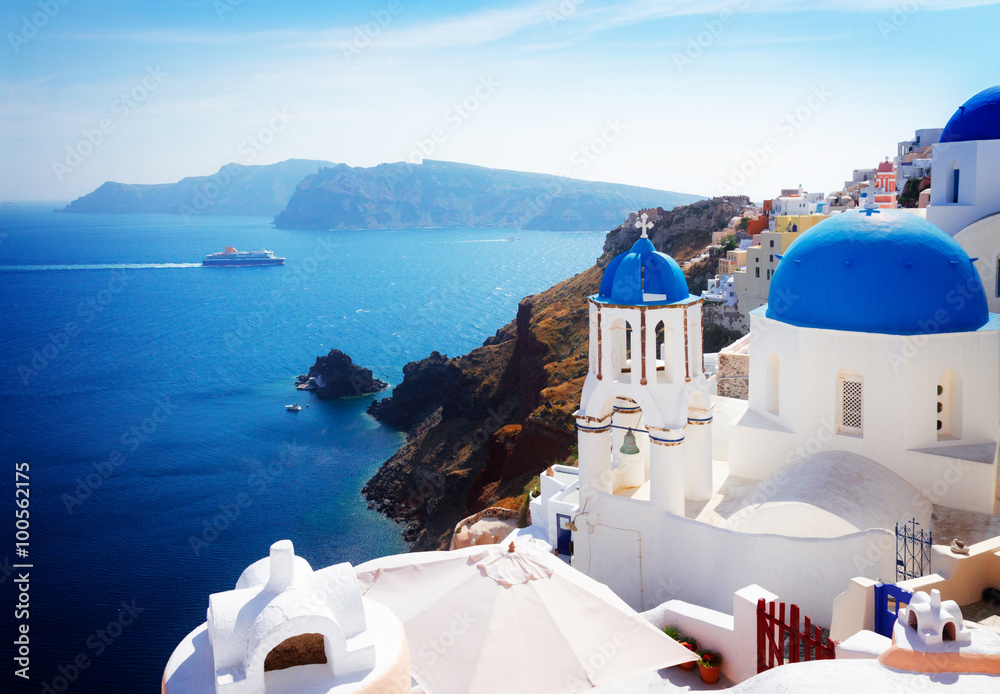 Fototapeta premium view of caldera with blue domes, Santorini