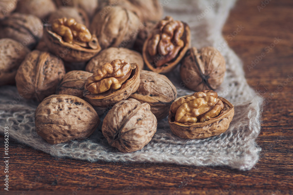 Walnuts on wooden background Walnuts on wooden background