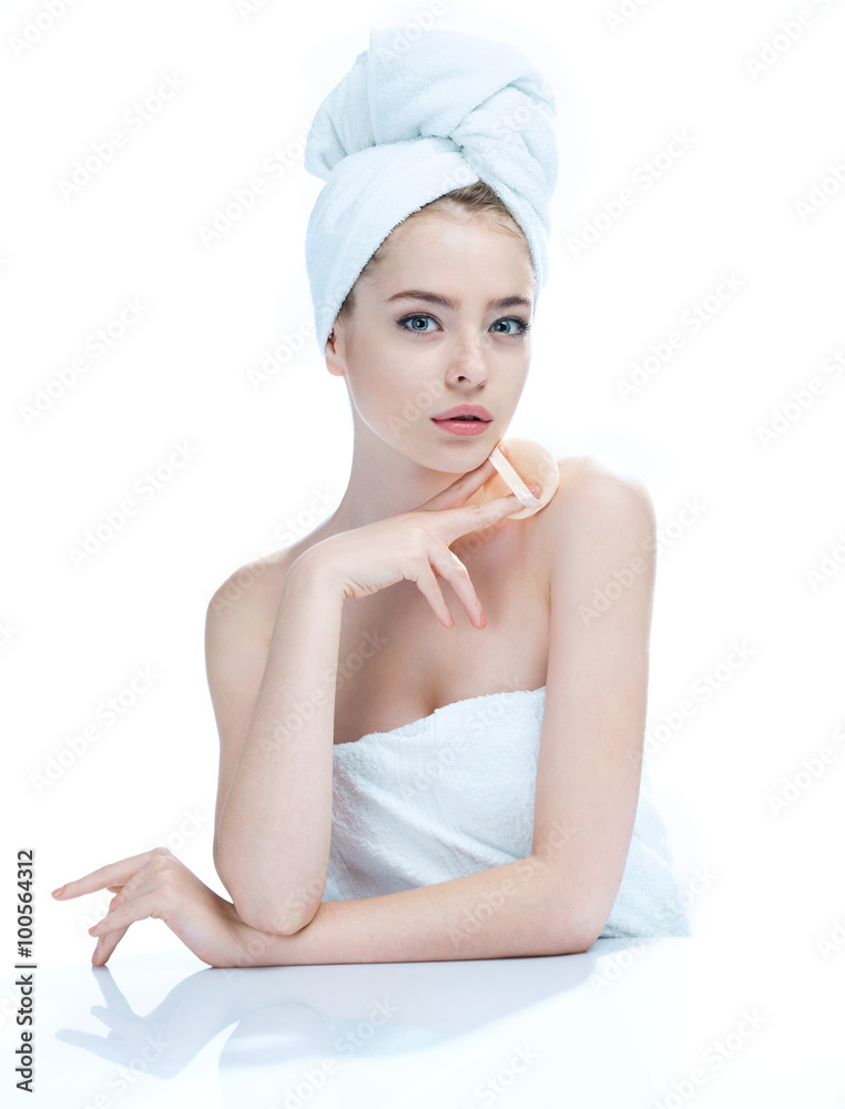 Pretty young girl enjoy a flawless skin, skin care concept / photo composition of blonde girl in towel - isolated on white background Pretty young girl enjoy a flawless skin, skin care concept / photo composition of blonde girl in towel - isolated on white background