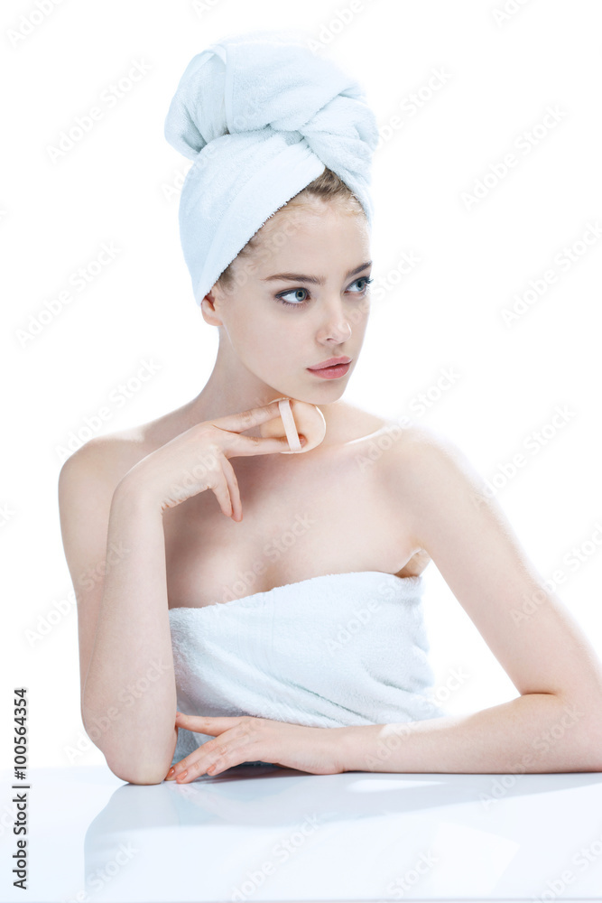 Pretty young girl enjoy a flawless skin, skin care concept / photo composition of blonde girl in towel - isolated on white background Pretty young girl enjoy a flawless skin, skin care concept / photo composition of blonde girl in towel - isolated on white background
