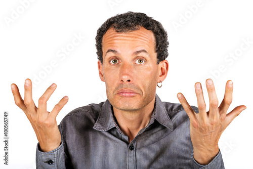 Konstfotografi Portrait of confused man giving I don't know gesture on white background