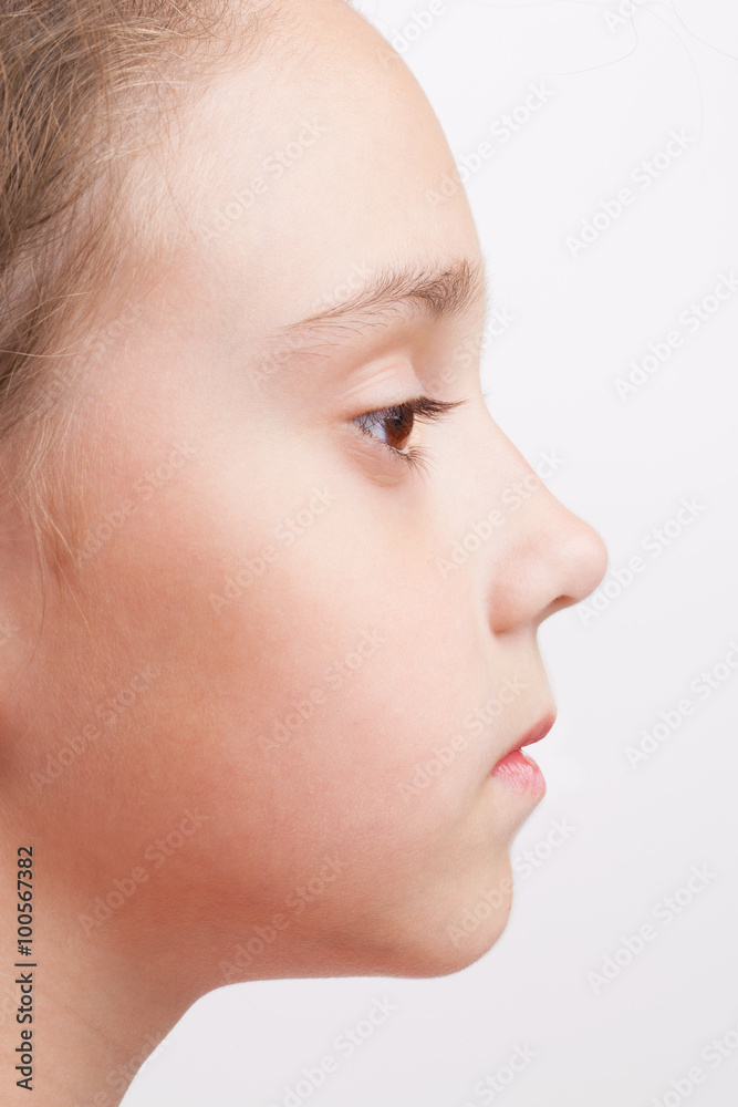 Profile of a child with open eye