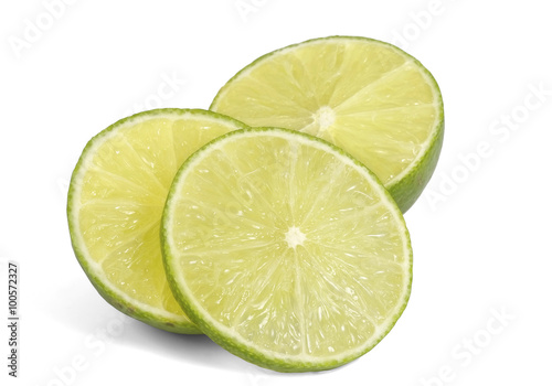 Slice of fresh lime / Slice of fresh lime on white background.