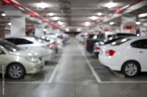 Blur image  Underground parking with cars.
