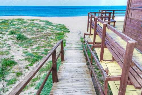 wooden path to the beach in Sardinia © Gabriele Maltinti