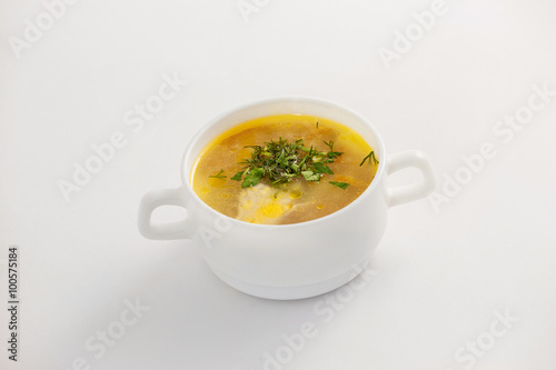 Closeup image of bowl with fresh chicken soup isolated 
