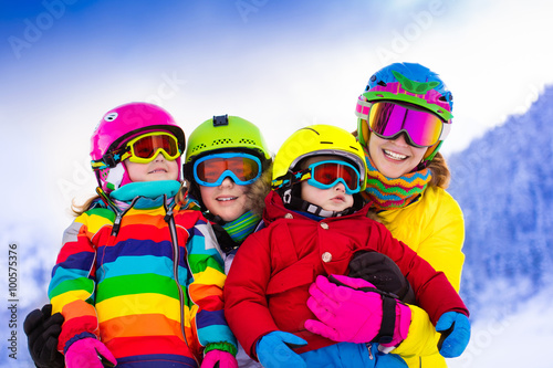 Family with children on winter ski vacation