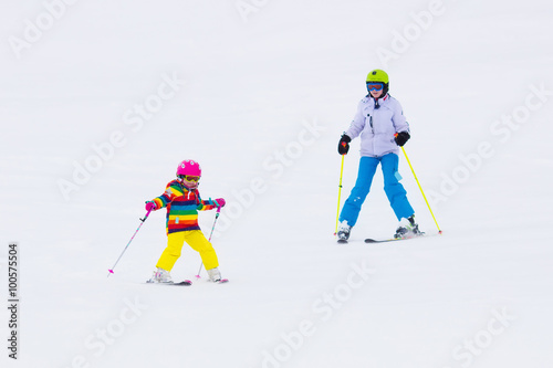 Kids skiing in the mountains