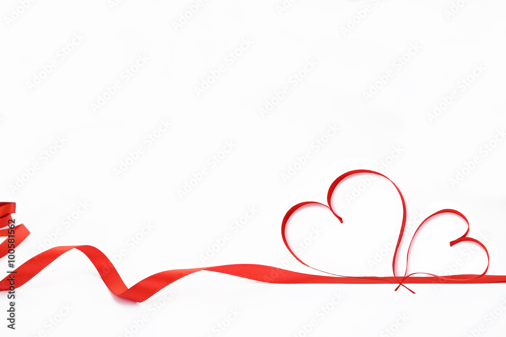 Ribbons shaped as hearts on white background.  Valentines day concept.