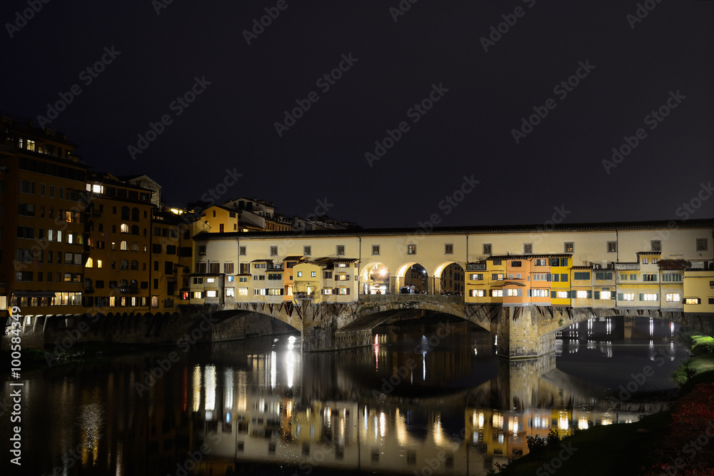 Ponte Vecchio and Arno river by night