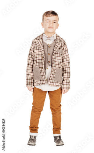 Portrait adorable young happy boy looking at camera isolated on © kaninstudio