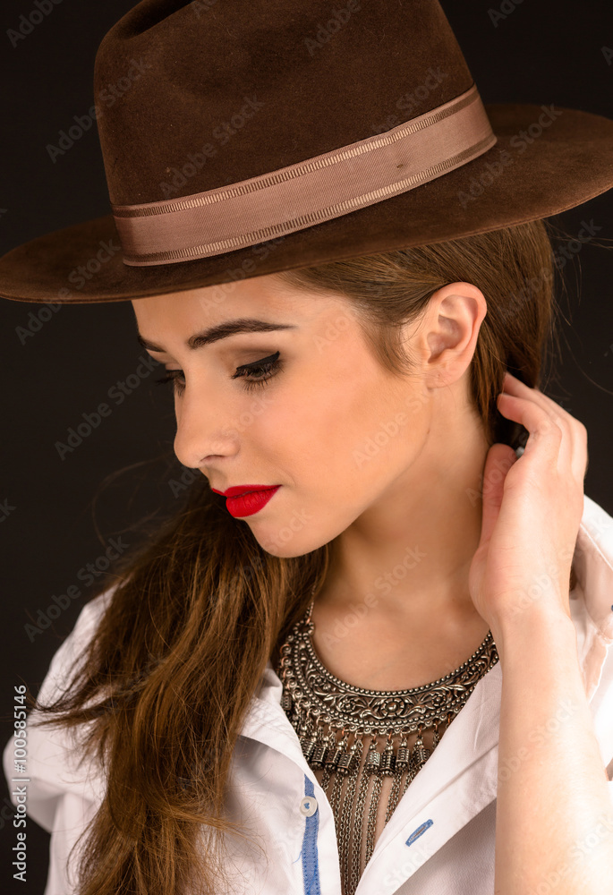 Beautiful model lady in hat in studio Beautiful model lady in hat in studio