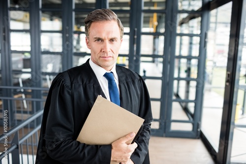 Serious lawyer looking at the camera