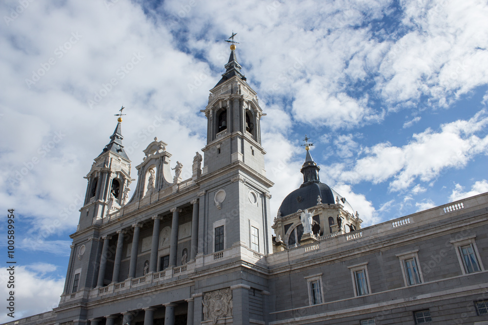 Facade of Almudena Cathedral in the center of Madrid, Spain.