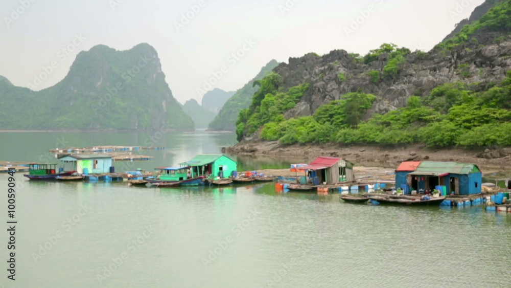 floating village at limestone islands, Halong Bay, Vietnam floating village at limestone islands, Halong Bay, Vietnam