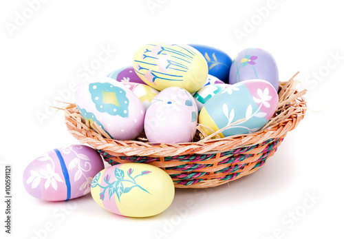 Colorful Easter Eggs and Basket on a White Background