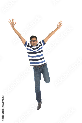 indian male jumping in joy