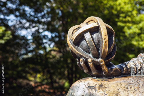 Photos OLSZTYN - POLAND AUGUST 20, 2015: Planet in hand of Nicolaus Copernicus statue n