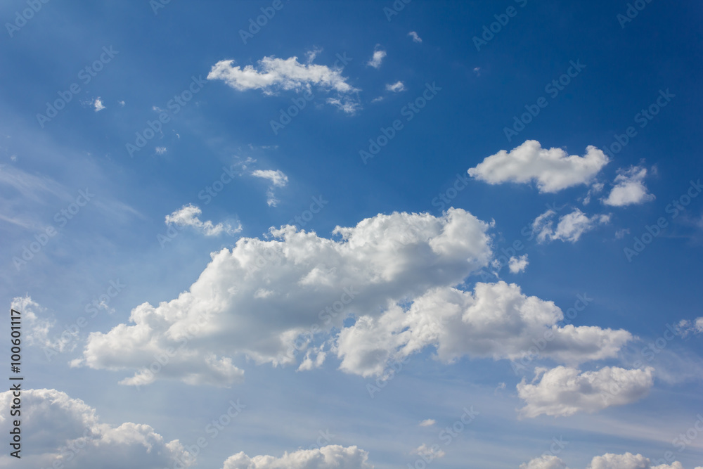 Beautiful light blue sky with puffy white clouds Beautiful light blue sky with puffy white clouds