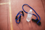 Sports Equipment expander and a bottle of water
