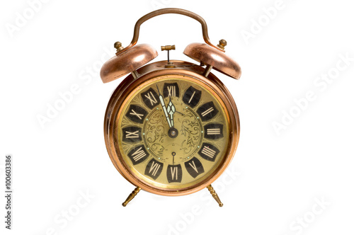Old copper metallic alarm clock