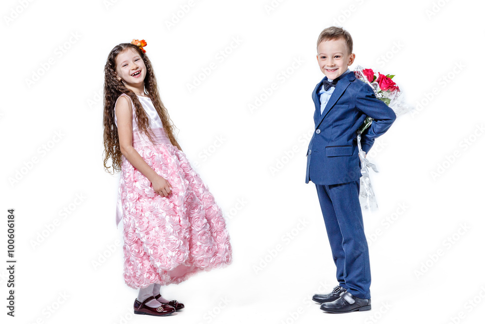 boy gives a girl flowers on the day of St . Valentine Stock Photo