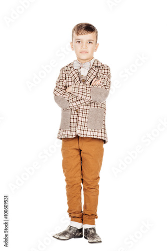 Portrait adorable young happy boy looking at camera isolated on