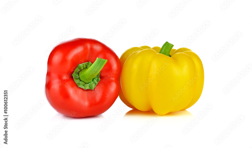 Two fresh peppers isolated on white background