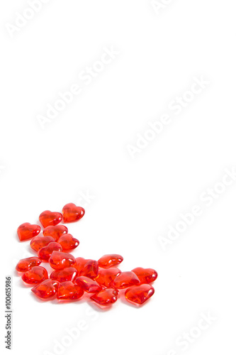 Scarlet little hearts on a white background