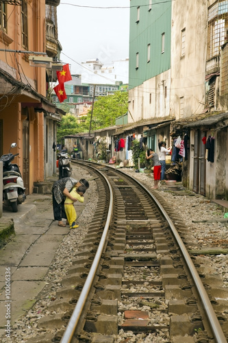 train passing through streets of hanoi slums, vietnam © kagemusha