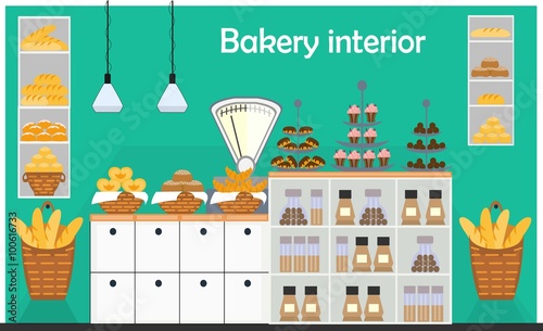 Bakery counter with scales and different types of bakery products. Bakery counter with different bread.  Baton and baguette, cupcake and muffin, croissant and cake