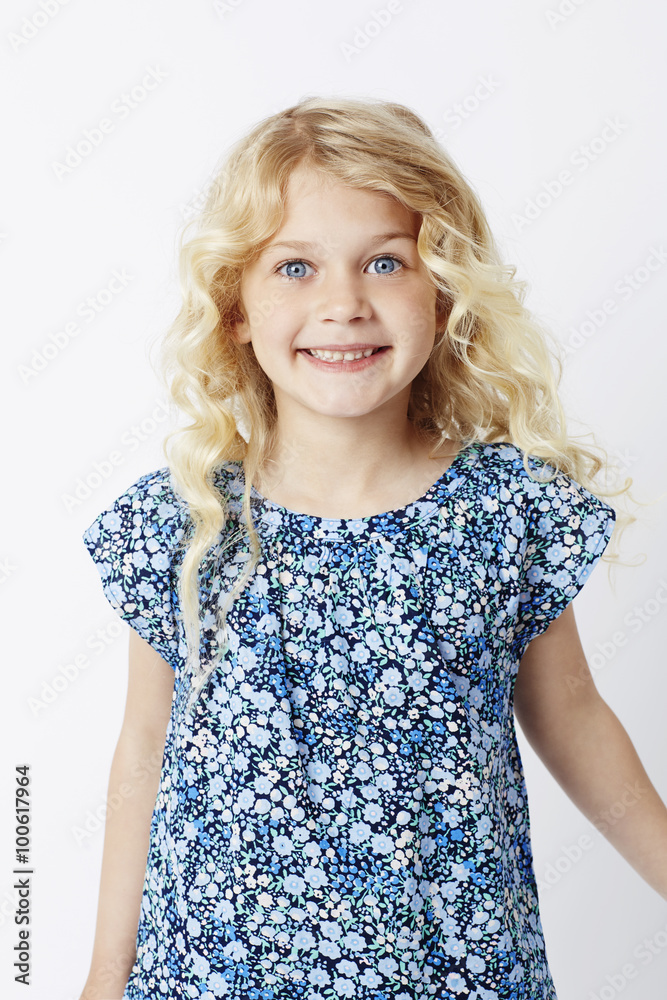 Smiling young blond girl, portrait Smiling young blond girl, portrait
