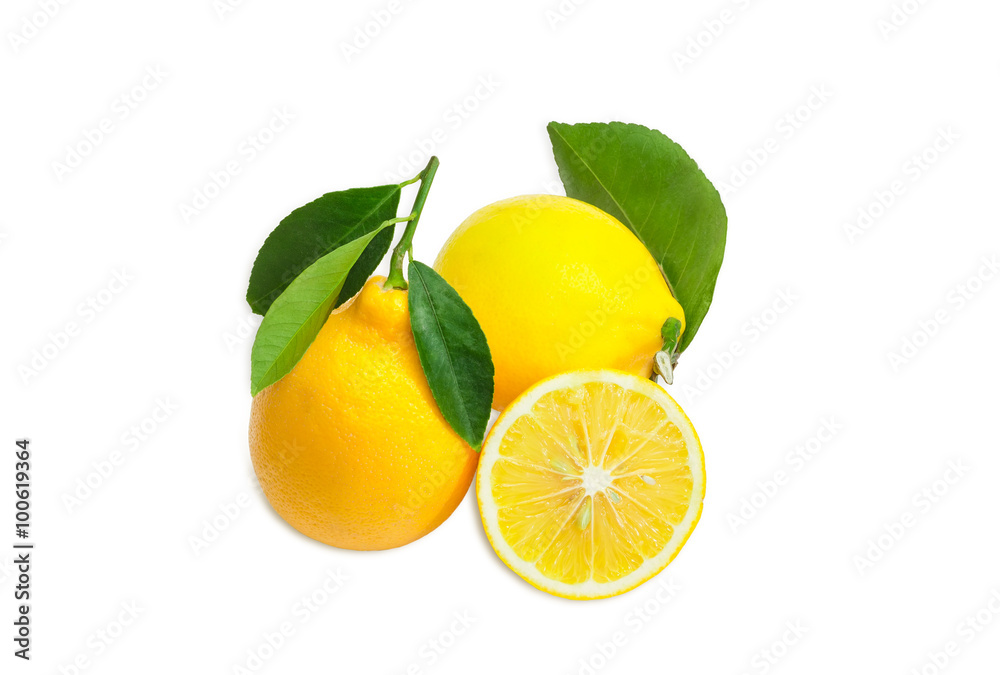 Two whole lemons with leaves and one cut lemon Two whole lemons with leaves and one cut lemon
