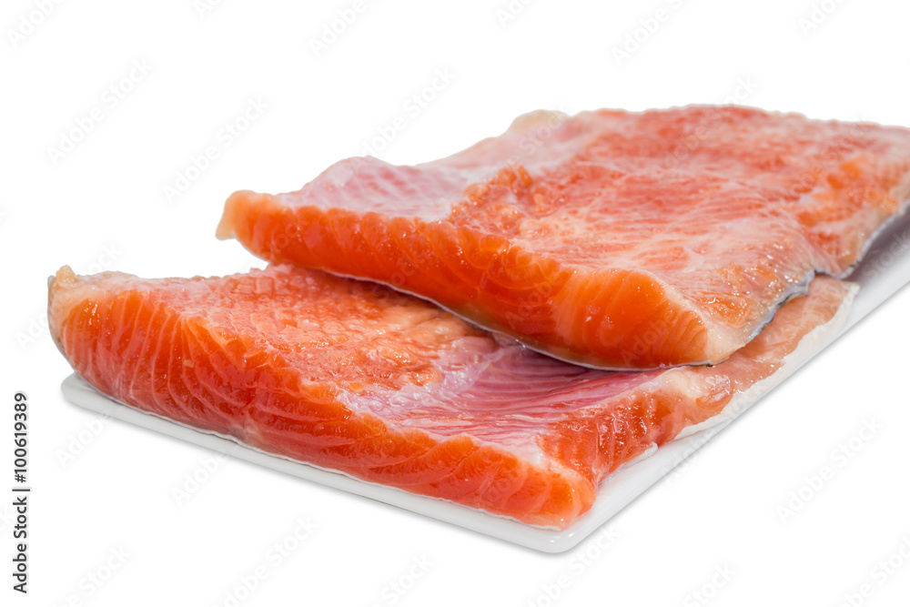 Fillet of rainbow trout on a light background