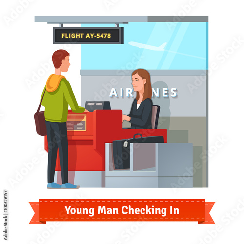 Man with big suitcase checking in at the airport