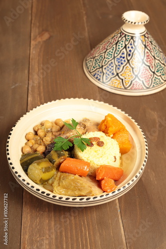 Couscous in a clay pot with drawings  