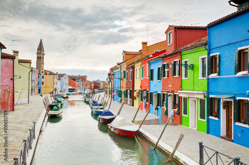 Brightly painted houses at the Burano canal © andreykr