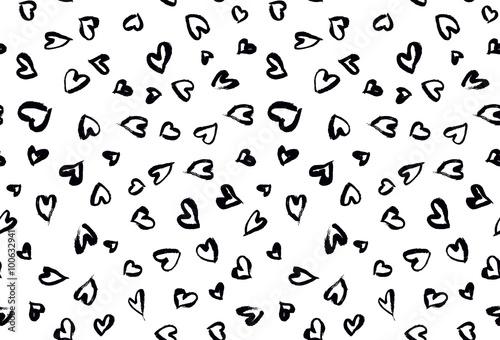 Seamless background pattern with hand drawn textured hearts