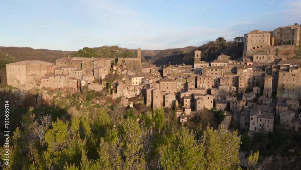 Panorama of medieval town Sorano at sunset in Tuscany, Grosseto, Italy Panorama of medieval town Sorano at sunset in Tuscany, Grosseto, Italy