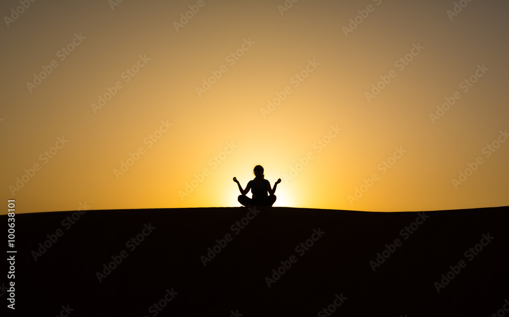 silhouette of a man sitting in a pose against the sky silhouette of a man sitting in a pose against the sky