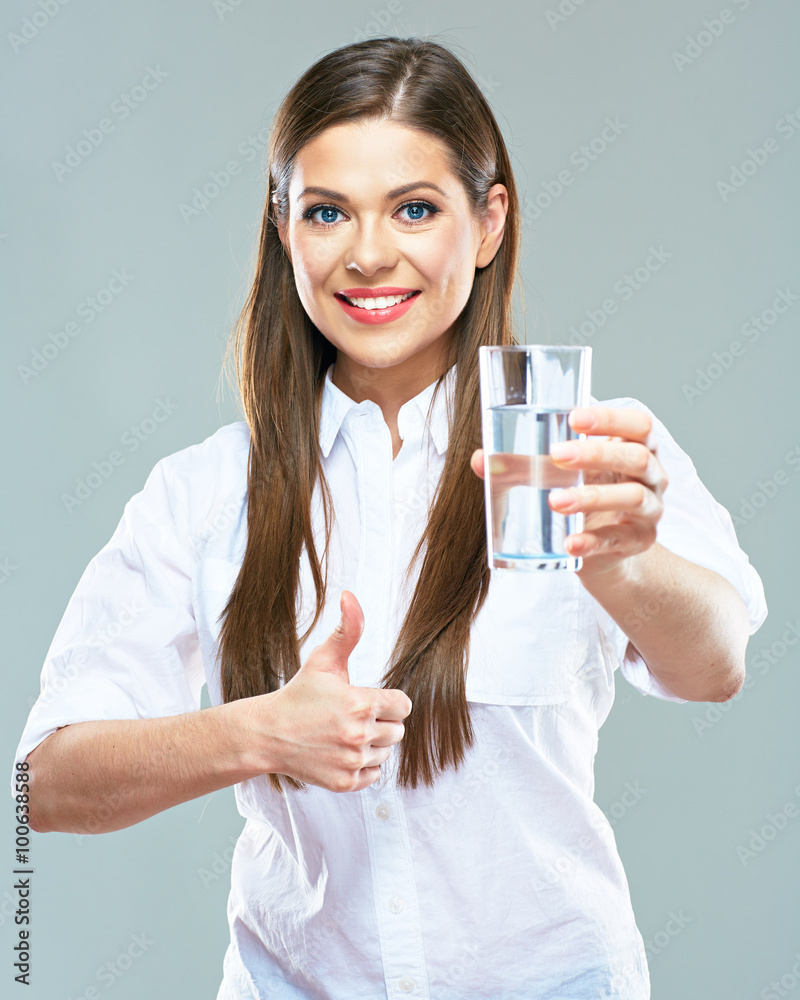 Smiling woman holding water glass. Isolated portrait Smiling woman holding water glass. Isolated portrait