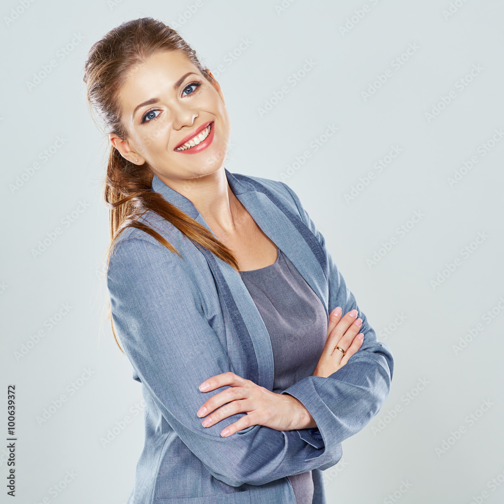Smiling business woman portrait. Gray suit.