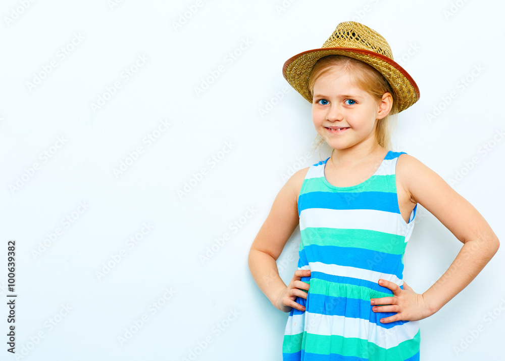 Little blonde girl with long hair posing on white background wi Little blonde girl with long hair posing on white background wi