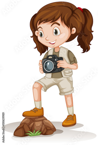 Little girl holding a camera