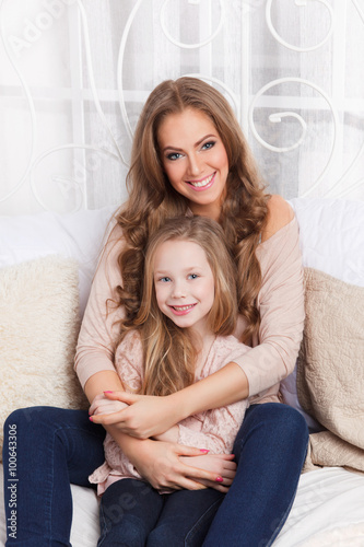 Beautiful young mother and daughter