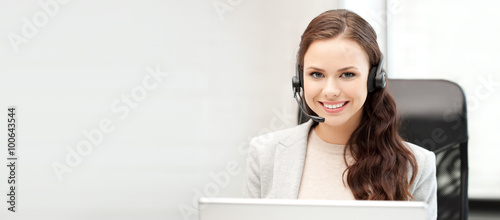 helpline operator with laptop computer photo